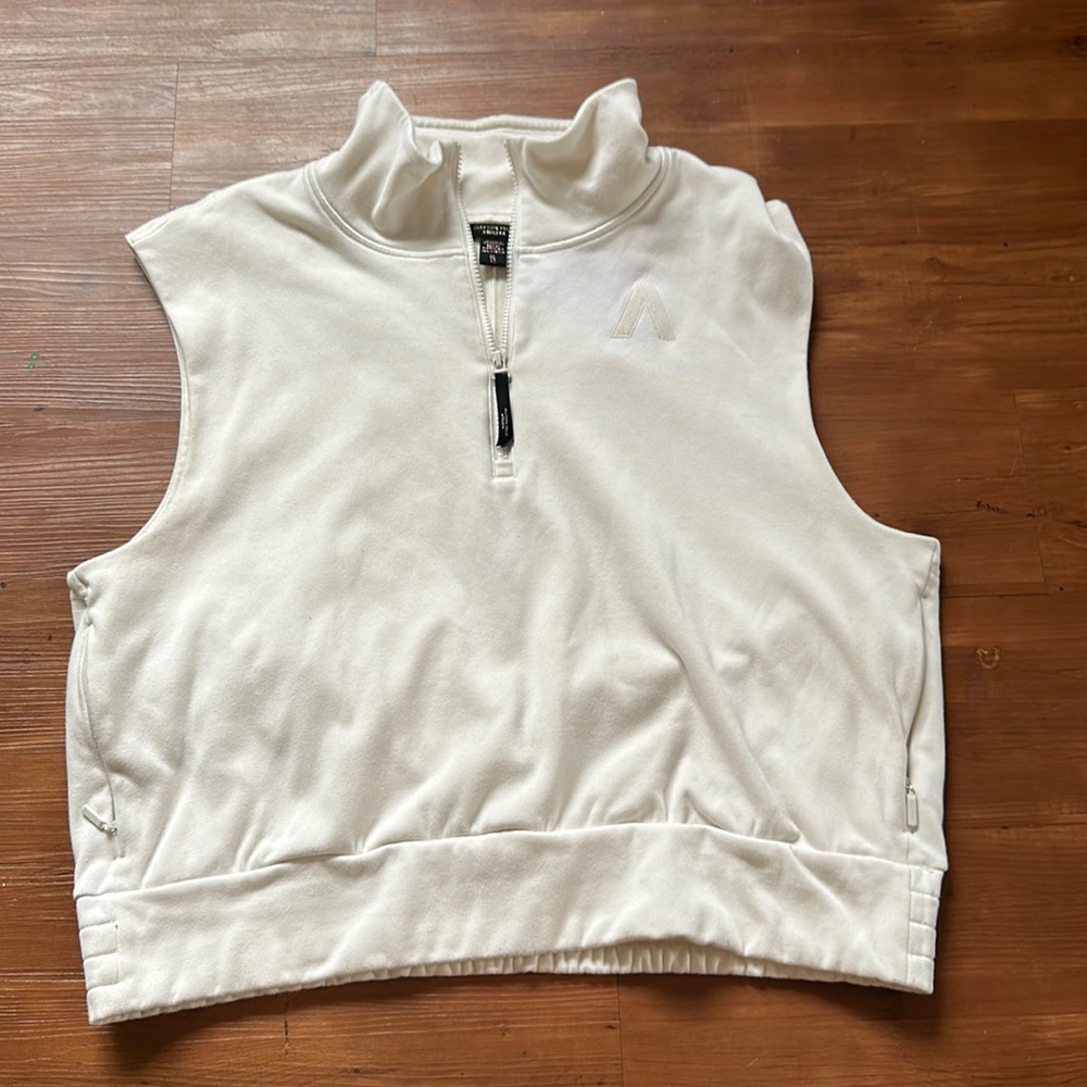 Athleta Allyson Felix cream sweatshirt vest.